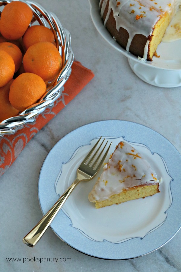 slice of clementine cake on blue and white plate