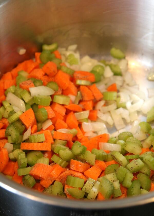 carrots, celery and onion in stock pot