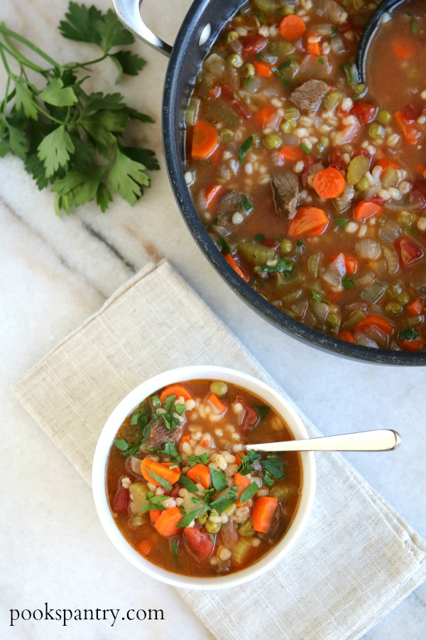 bowl of soup with pot in background for dinner divas meal plan