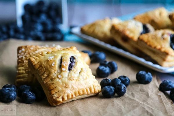 blueberry mini pies on butcher paper