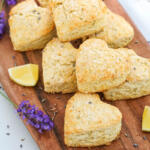 Lemon and lavender scones on wooden board.