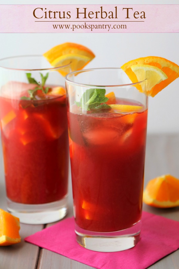 glasses of herbal iced tea with citrus garnish