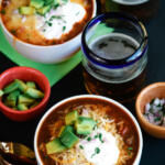 bowls of instant pot beer chili with glasses of beer