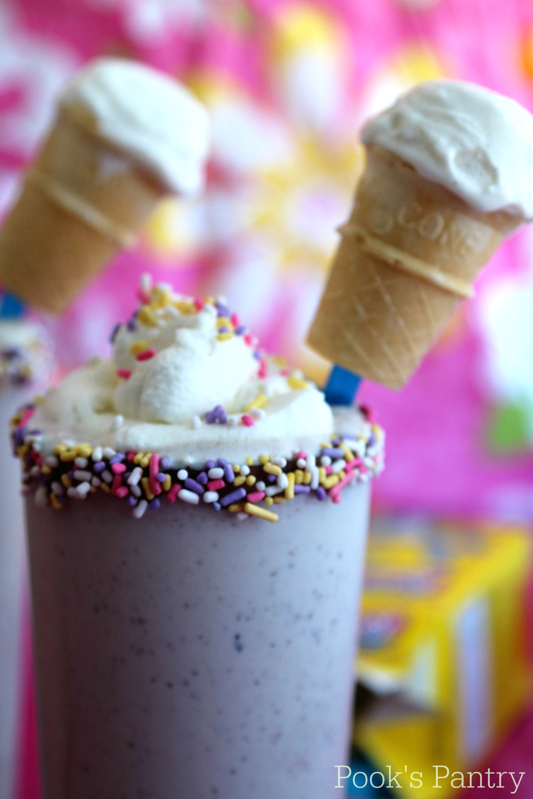 malted milkshake with mini cone and sprinkles