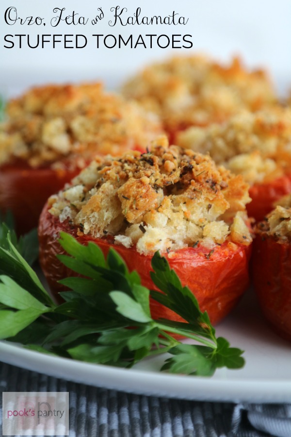 Greek stuffed tomatoes topped with buttery toasted breadcrumbs.