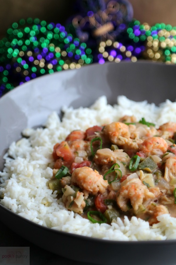 Langostino Étouffée with rice in gray bowl