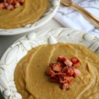 bowl of split pea soup with ham