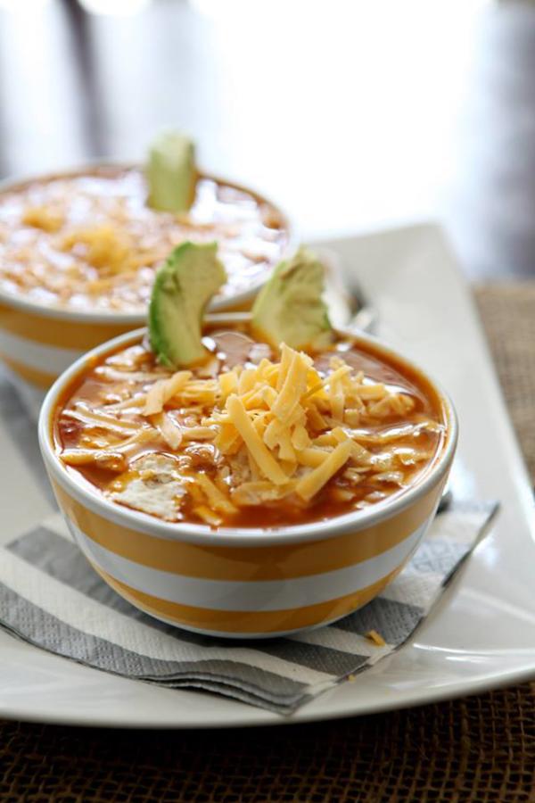 Turkey Tortilla Soup in white and yellow striped bowl