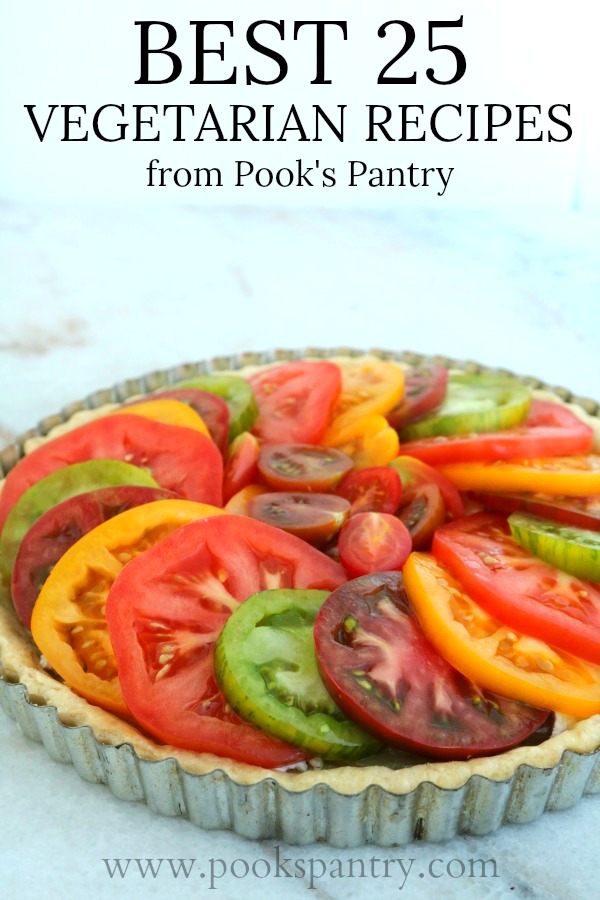 Best vegetarian recipes for dinner tomato tart with rainbow colored tomato slices.