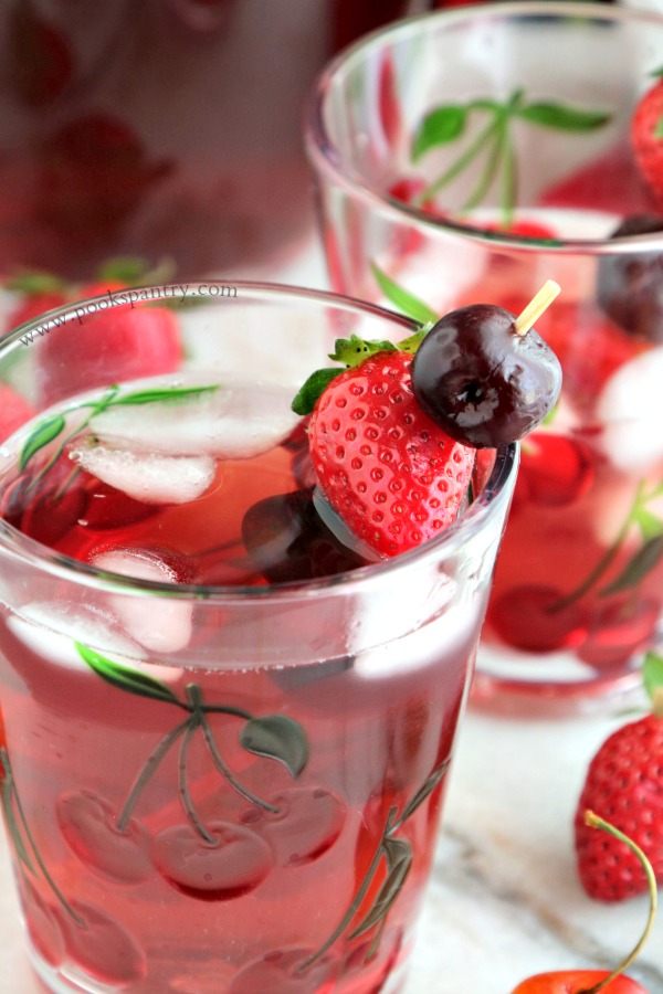 close up of strawberry cherry wine spritzer