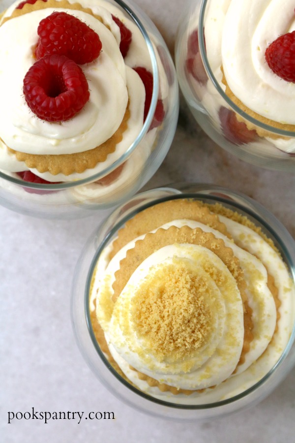 overhead view of no bake cheesecake parfaits in clear glasses