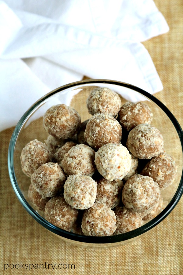 overhead shot of coconut balls with white napkin in background