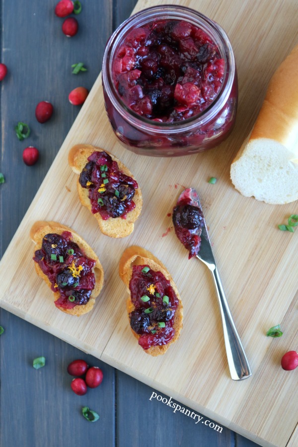 cranberry chutney toasts on wooden board