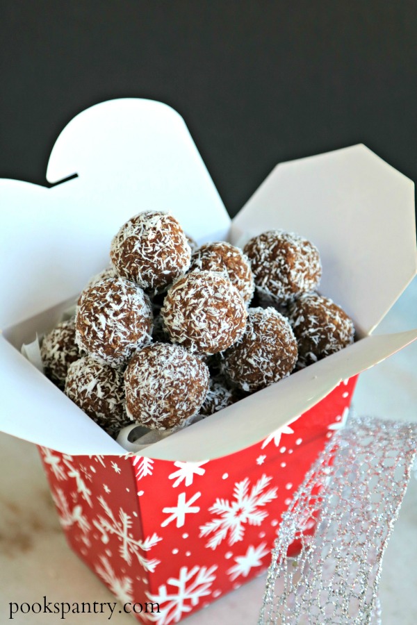 Gluten free run balls in red and white takeout gift box.