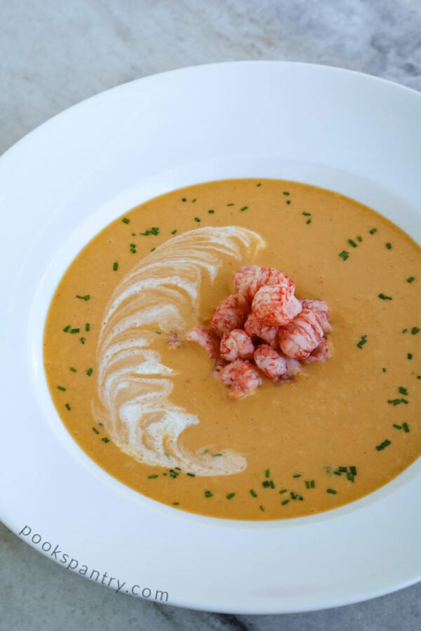 restaurant quality langostino bisque in wide, shallow bowl