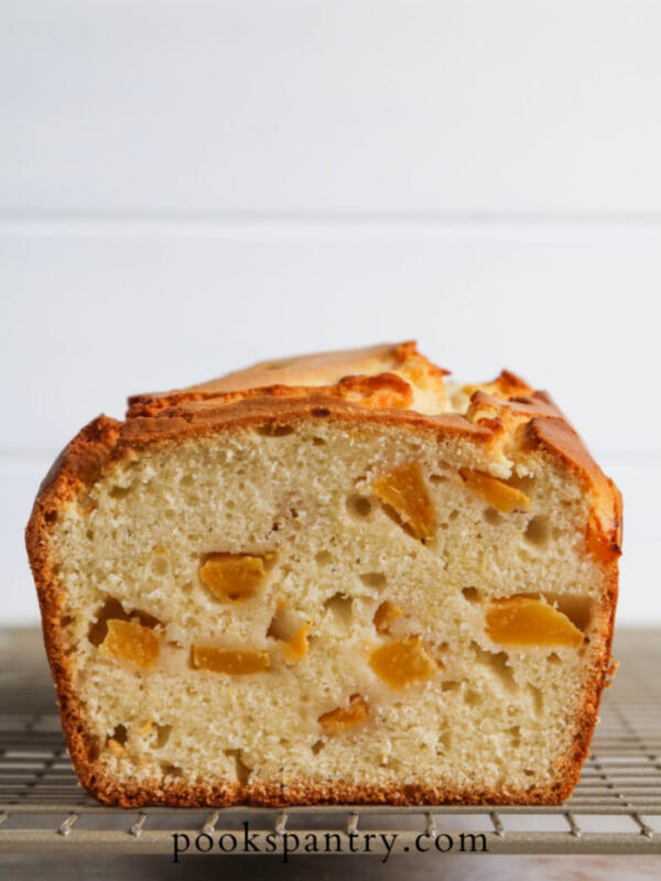 sliced peach pound cake on cooling rack