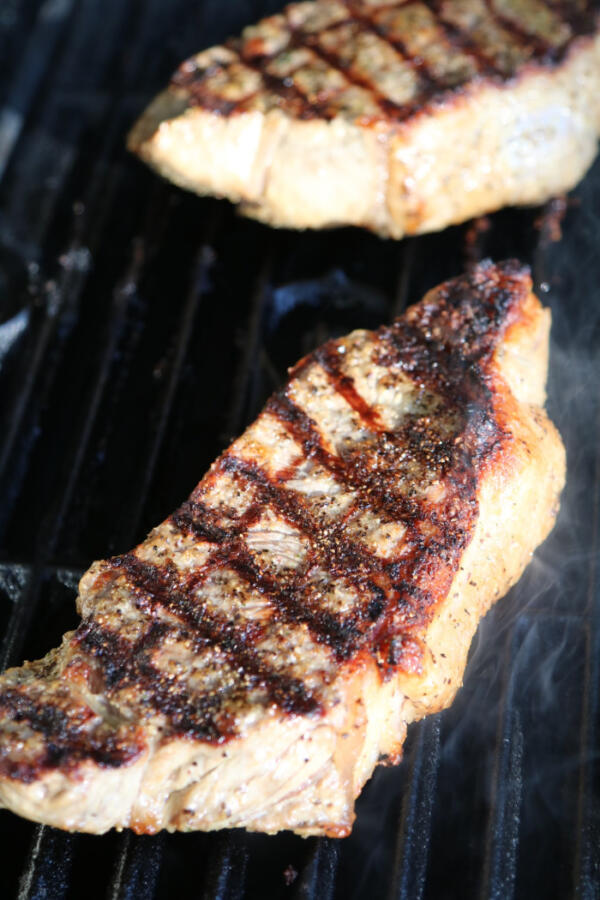 Steak with cross hatch marks on grill.