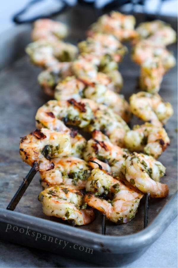 grilled shrimp skewers with gremolata on sheet pan