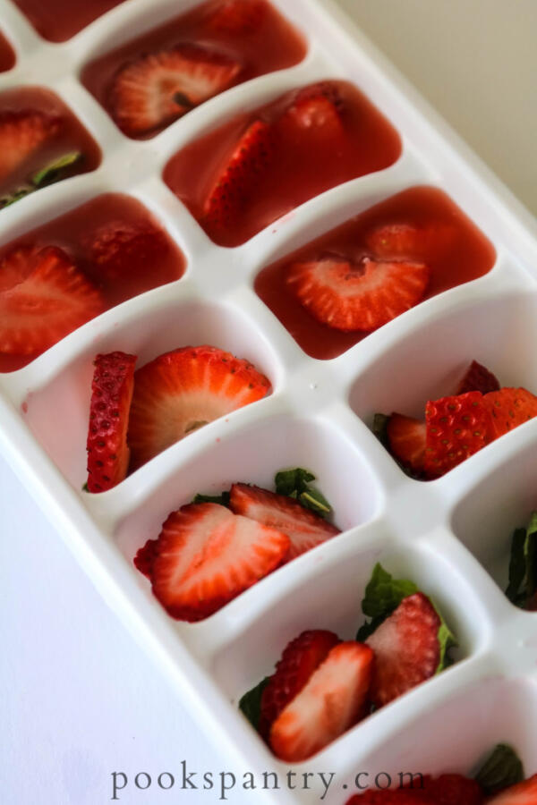 watermelon juice ice cubes with strawberries and mint