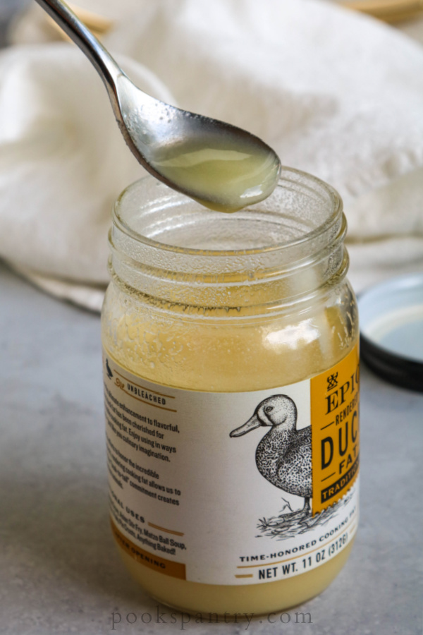 jar of rendered duck fat for fingerling potato recipe
