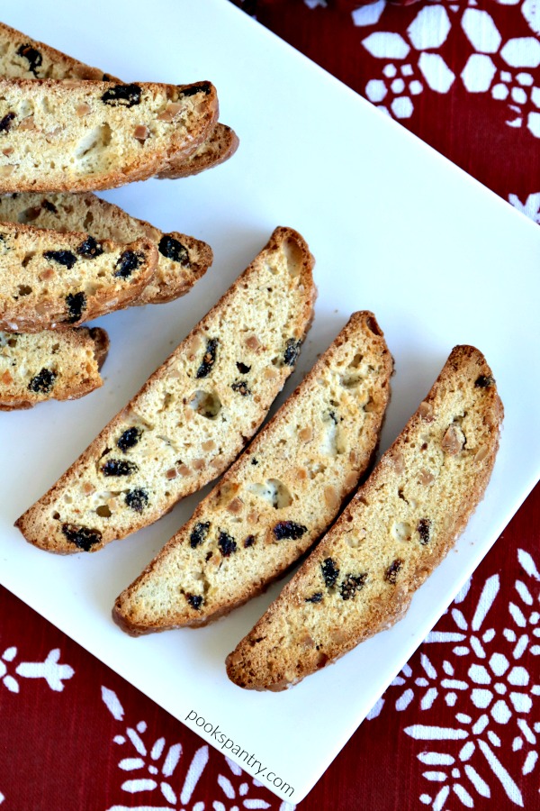 almond and raisin biscotti on plate with red tablecloth