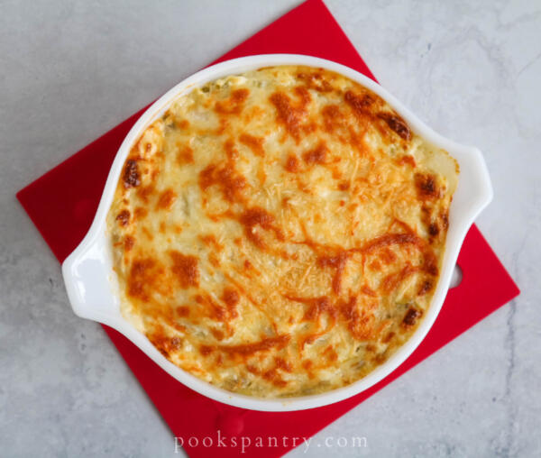 Langostino artichoke dip with browned cheese top