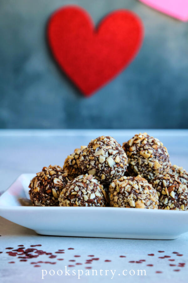 chocolate dipped coconut truffles with toasted almonds