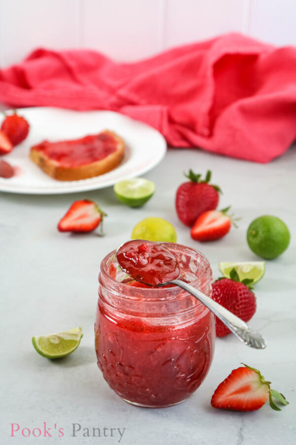 strawberry key lime jam in jar with spoon