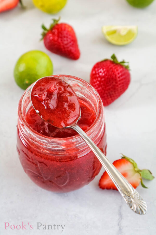 strawberry key lime jam on antique spoon