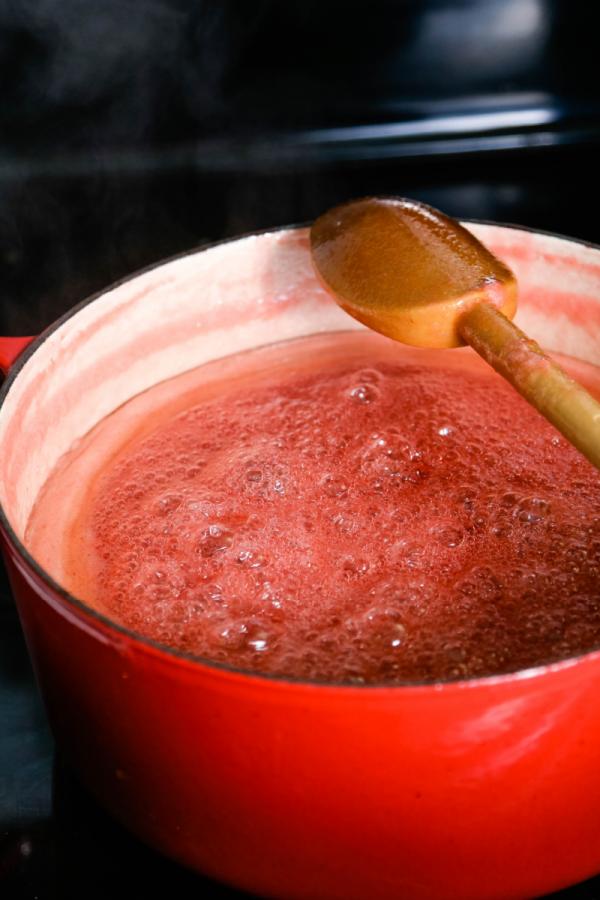 boiling jam in red pot