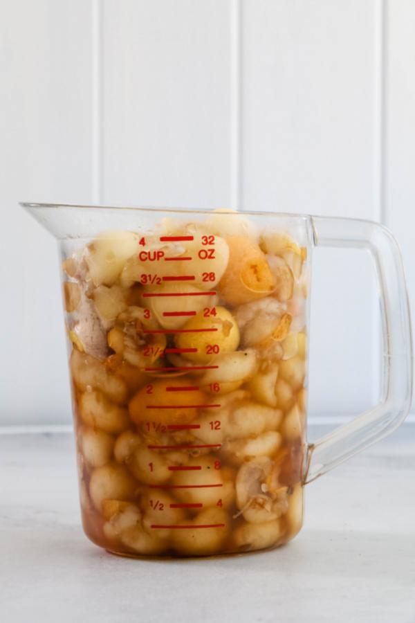 loquats in measuring cup