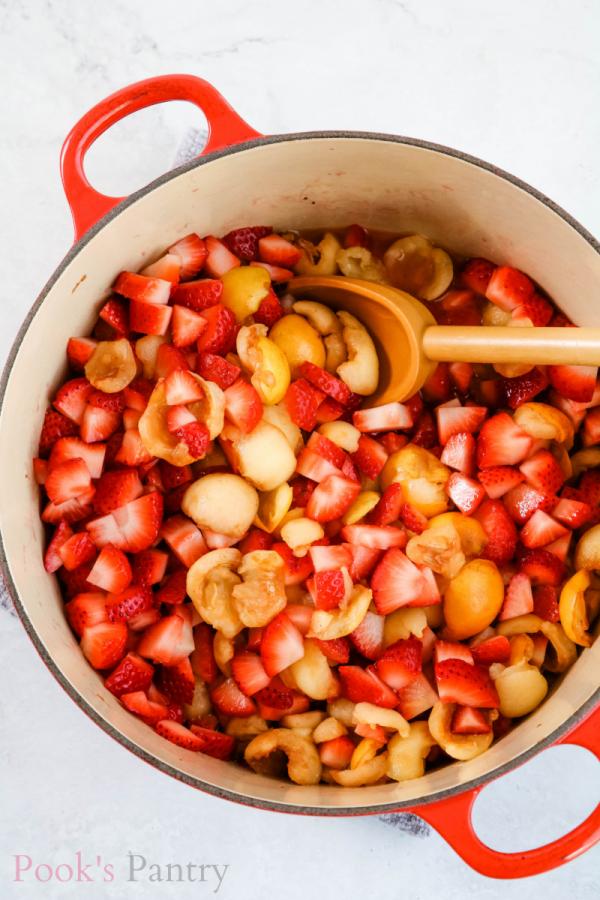 strawberries and loquats in pot