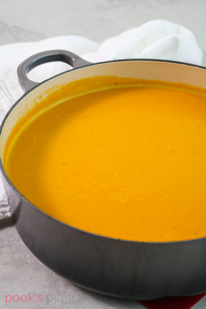Puréed squash soup in Dutch oven pot.
