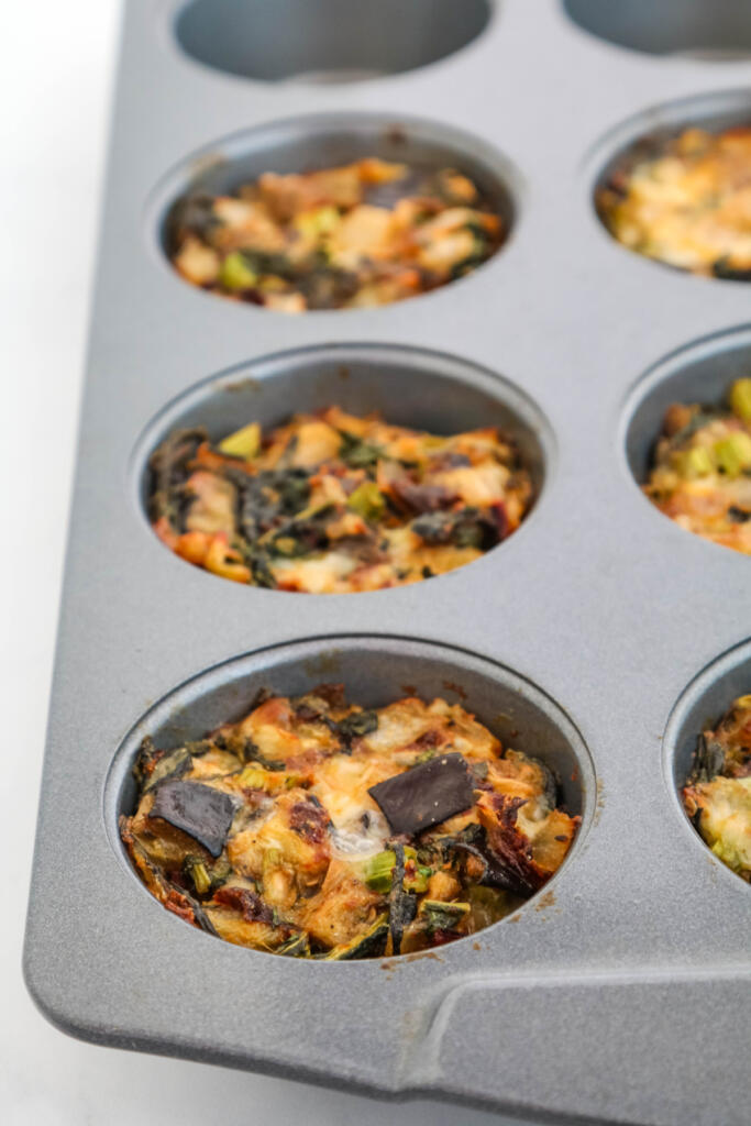 Baked Italian vegetable cakes in muffin tin.
