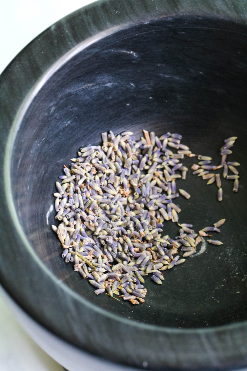 Lavender buds in mortar and pestle.