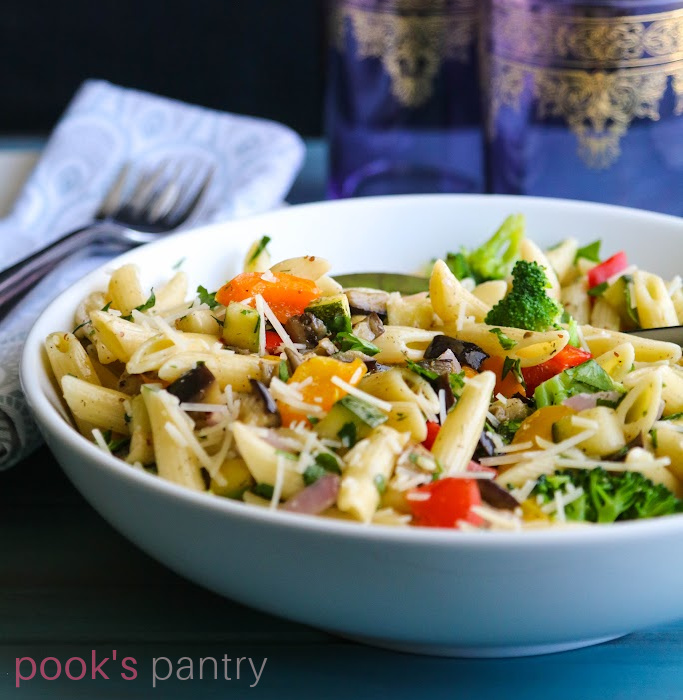 Vegetable pasta with Parmesan cheese.