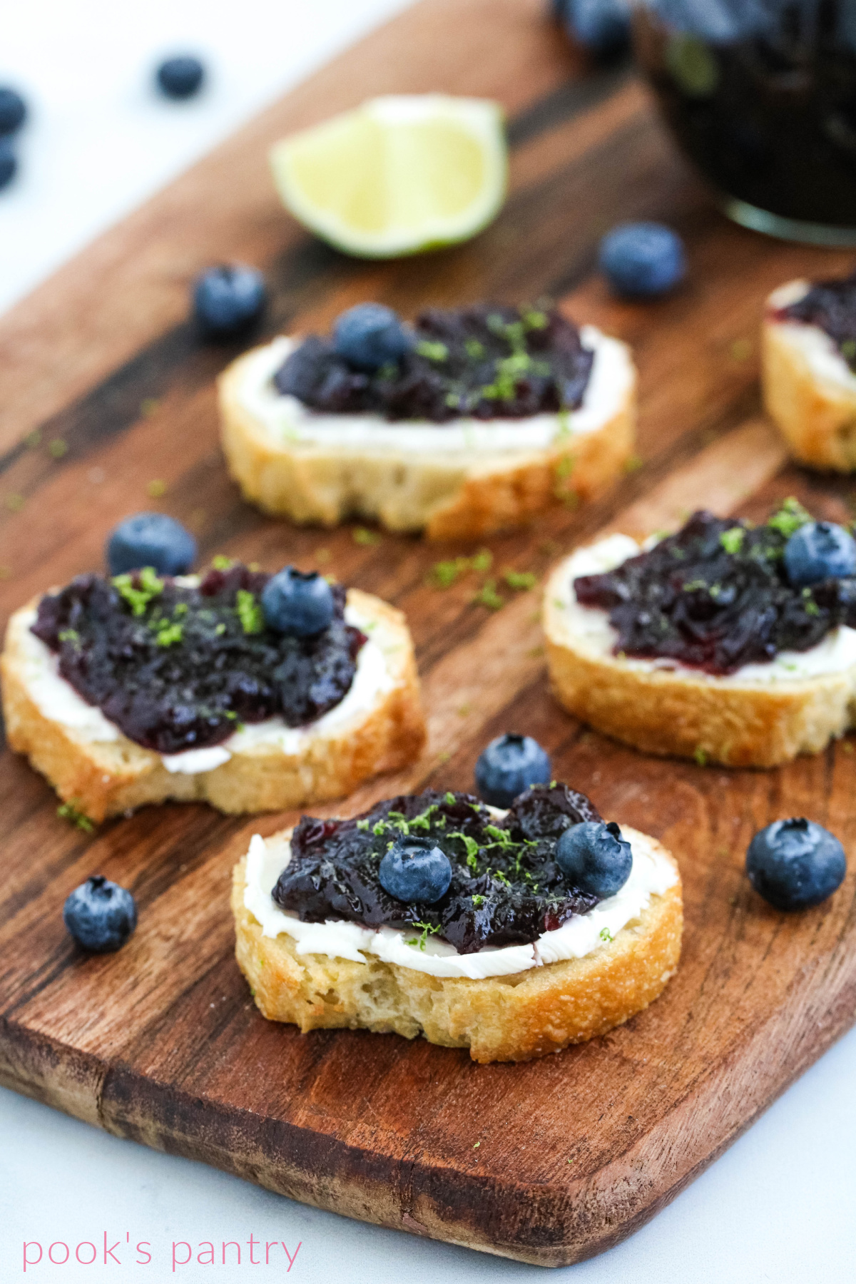 Blueberry lime with jam on crostini.