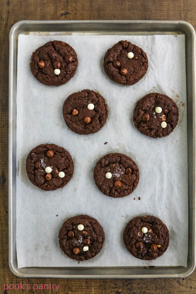 Perfect chocolate chocolate chip cookies on sheet pan.