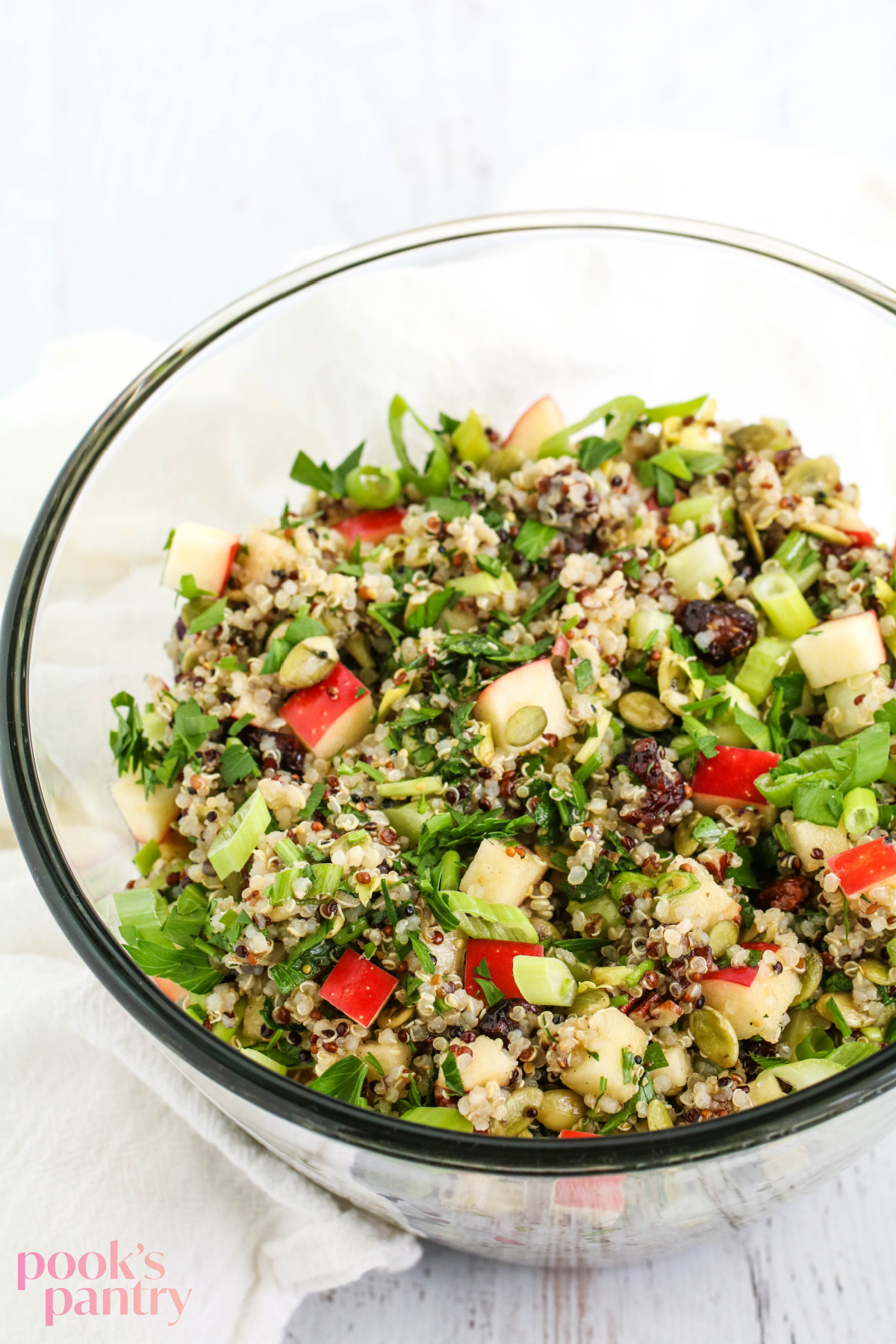 Apples and cranberries with quinoa and herbs.