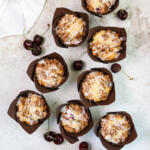 Cherry muffin recipe in brown tulip papers.