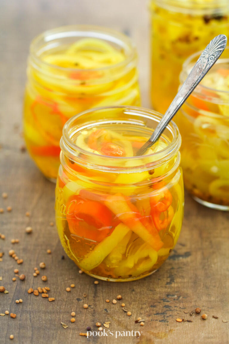 Pickled banana peppers in jar.