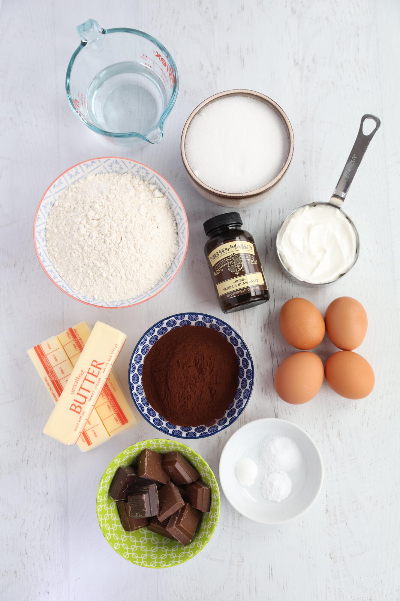 Ingredients for devil's food cupcakes on a white background.