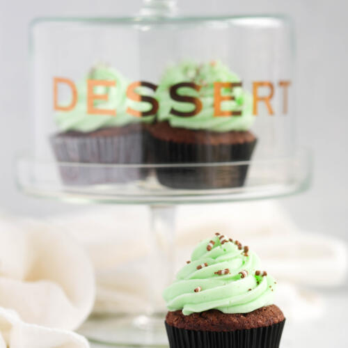 Devil's food cupcakes with creme de menthe buttercream, garnished with chocolate mint candies.