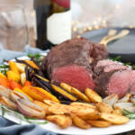 Porcini crusted beef tenderloin for Christmas dinner with roasted vegetables.