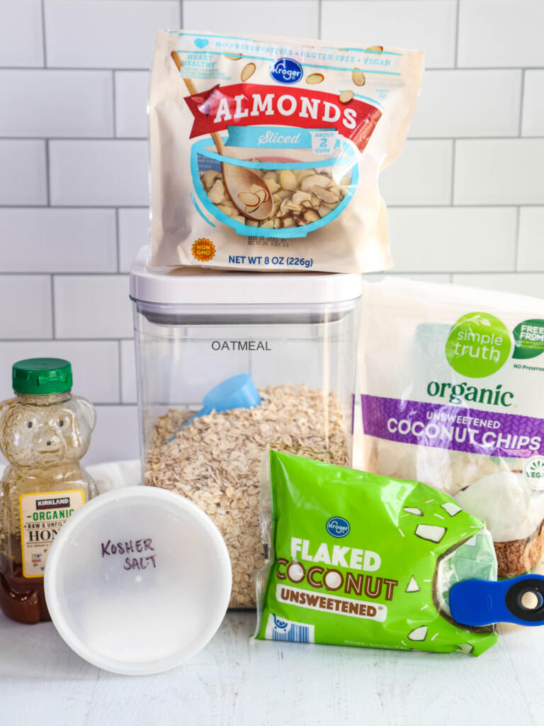 Ingredients for coconut granola on a white background.