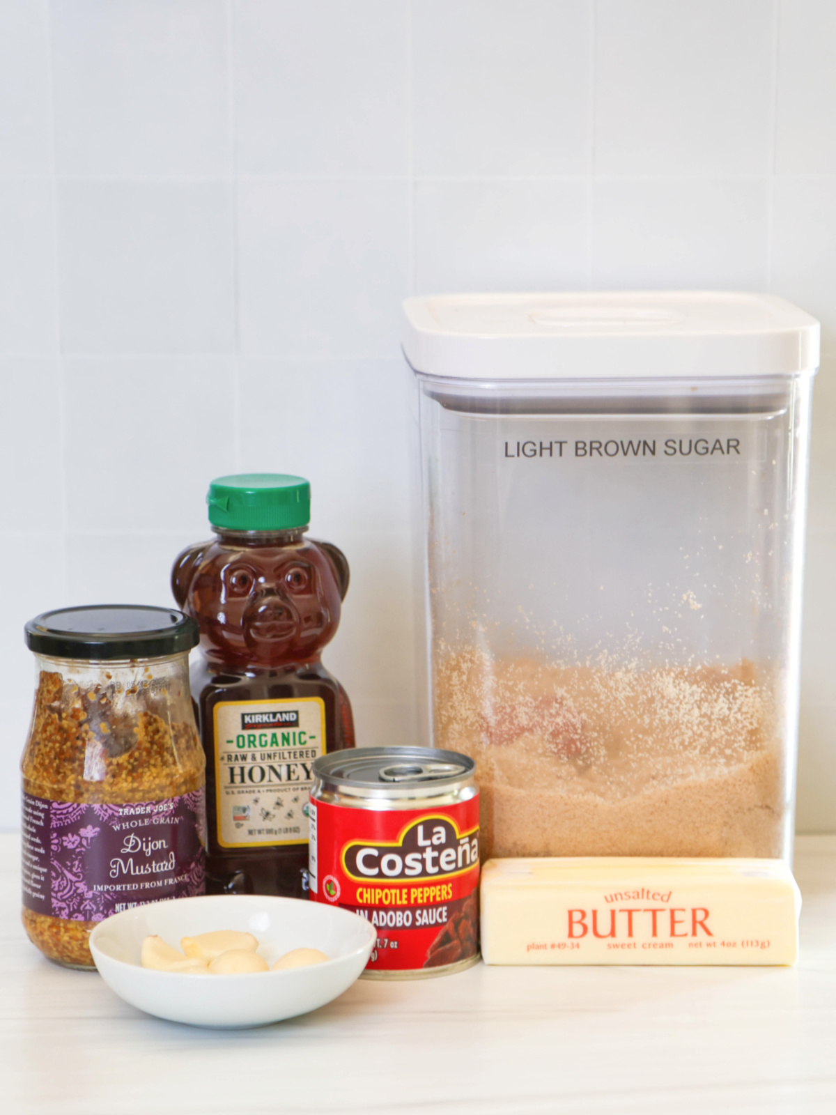 Ingredients for ham glaze recipe on a white background.