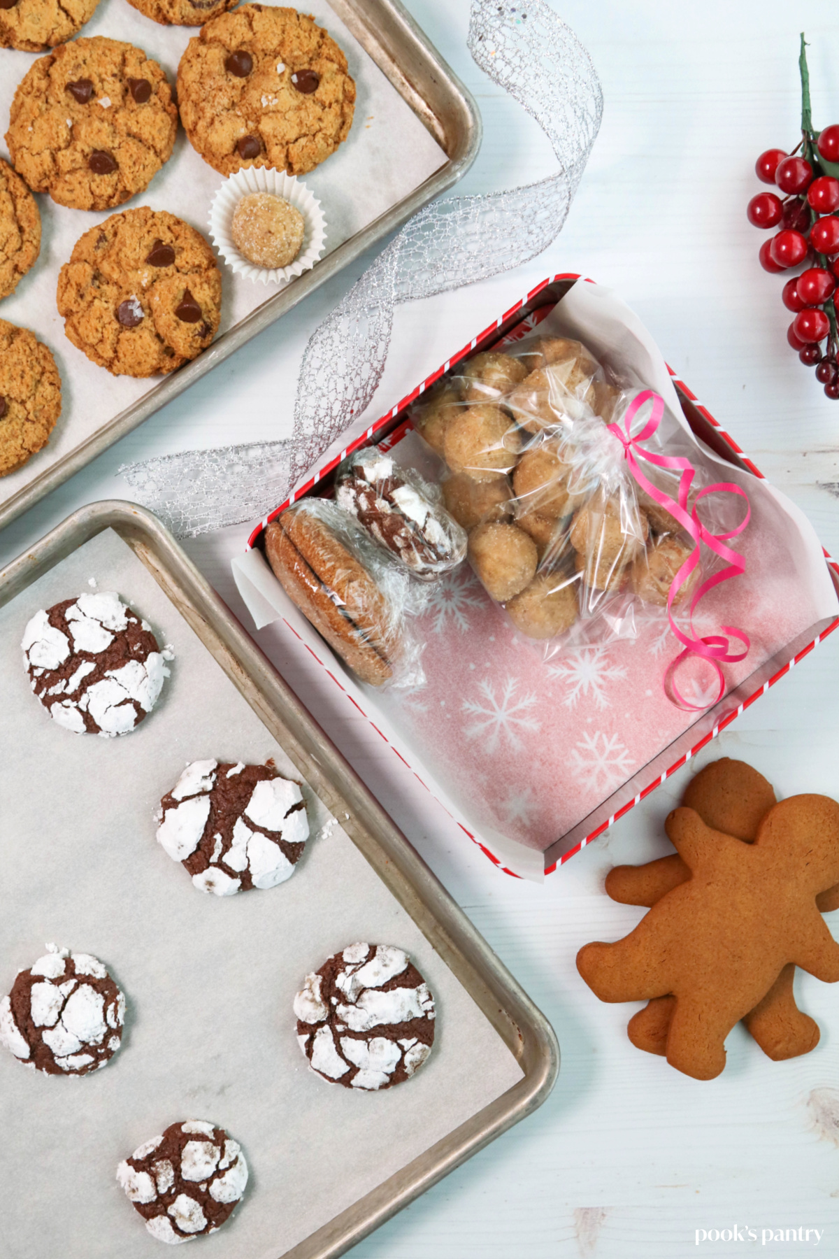 Overhead photo showing how to pack a cookie tin with wrapped cookies and treats.