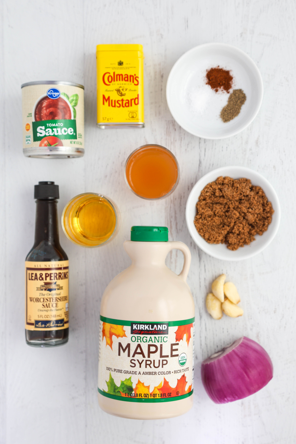 Ingredients for BBQ sauce on a white background.