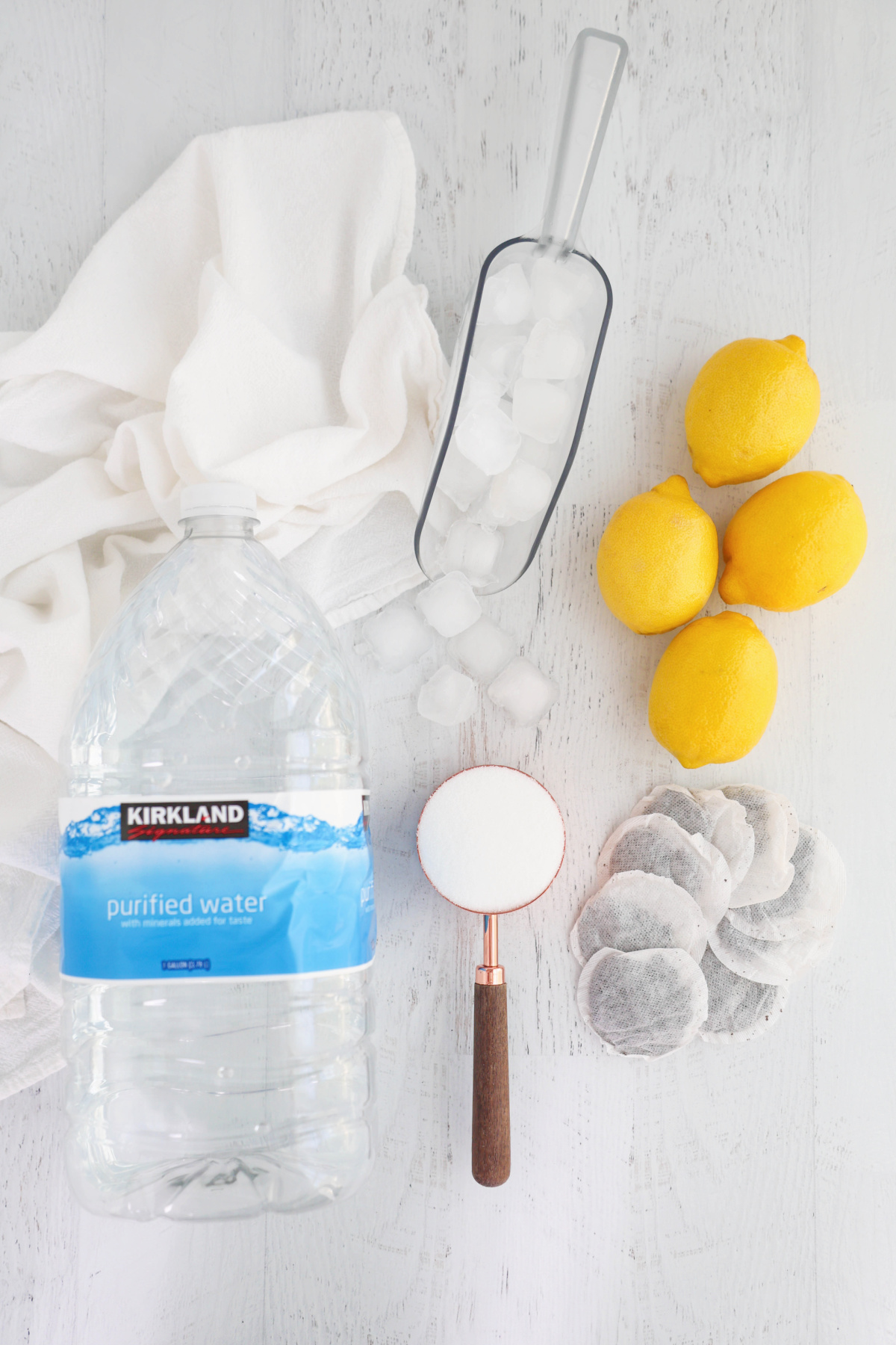 Ingredients for sun tea Arnold Palmer drinks on a white background.