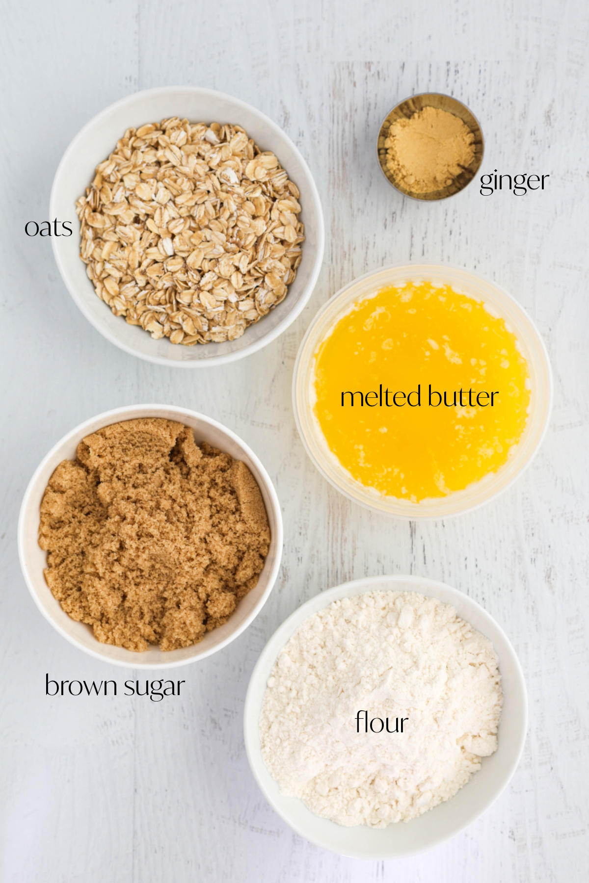 Ingredients for crumble topping on a light-colored background.